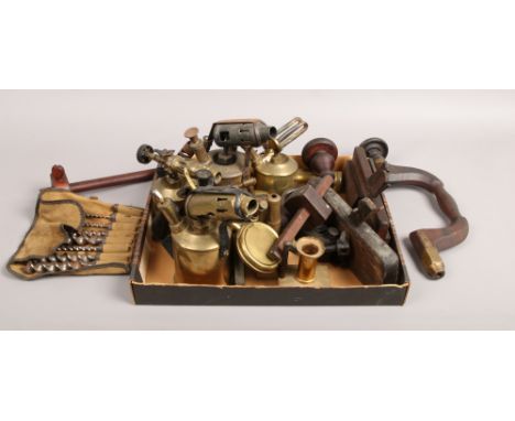 A tray of vintage tools brass blow lamps rebate planes, scribes, bits and brace etc.