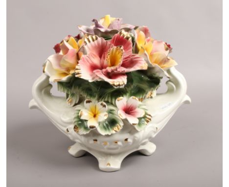 A large ceramic Capodimonte flowers centrepiece.