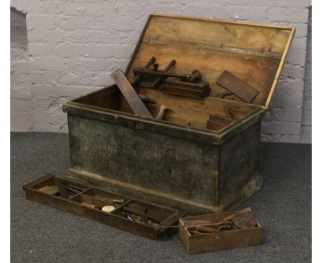 A pine tool chest and contents of various tools.