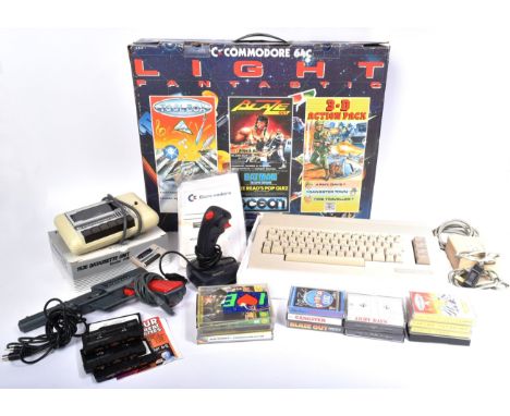 Retro Gaming - an original vintage 1980s (1989) Commodore 64 /C64 Light Gun Fantastic video game console pack. The pack conta