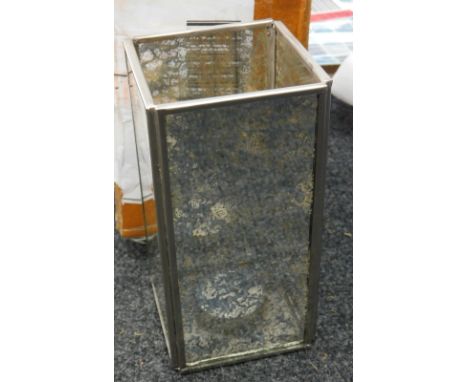 A Pacific Home blue glass and metal tea light holder, RRP £24.99.