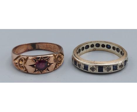 A yellow metal ring set single Amethyst together with a 9ct gold Eternity ring 