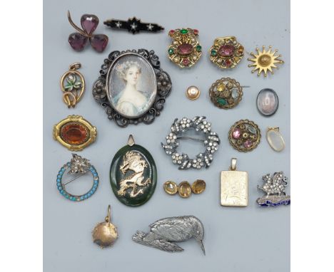 An Edwardian brooch with portrait miniature together with a collection of jewellery to include brooches and pendants 