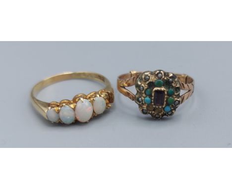 A 15ct gold Opal set dress ring together with a similar Turquoise set dress ring 