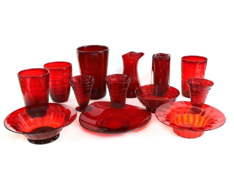 A collection of ruby Whitefriars glass, designed by Marriott and Barnaby Powell, comprising: wave and ribbon trailed vases an