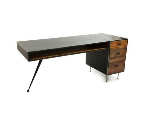 A contemporary metal and wood desk, with a shelf and three wood mounted drawers, 166cm wide 66cm deep 74cm high