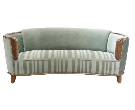 An Art Deco curved sofa, with an oak frame, 190cm wide 85cm deep 73cm high, seat 42cm