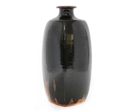 *Jim Malone (b.1946), a stoneware bottle vase, the facet body in a tenmoku glaze, artist's monogram and Ainstable seal, 30cm 