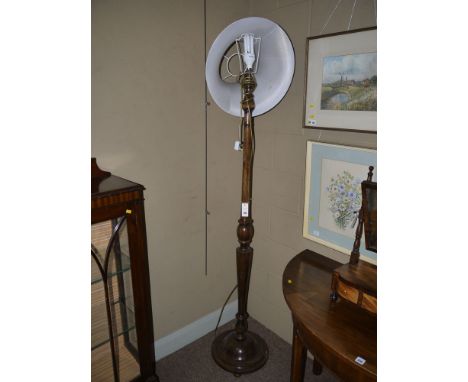 A wooden standard lamp and shade; together with a metal standard lamp and shade