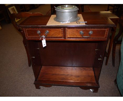 A reproduction inlaid mahogany open bookcase with two shallow drawers, the top fitted an adjustable shelf.