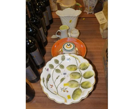 A quantity of ceramics, including: a Royal Worcester comport; a Poole preserve jar; a Carlton ware bowl; a Burleigh ware jug 