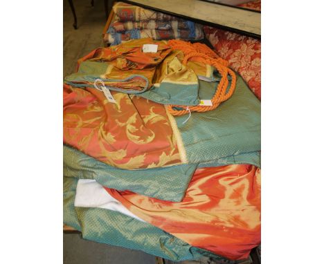 A pair of large shaped drapes, probably for a bay window, with orange lining and padding; a pair of matching cushion covers a