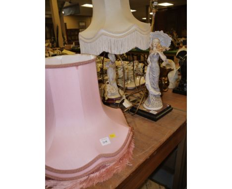 A Lladro table lamp and shade; together with another table lamp and shade.