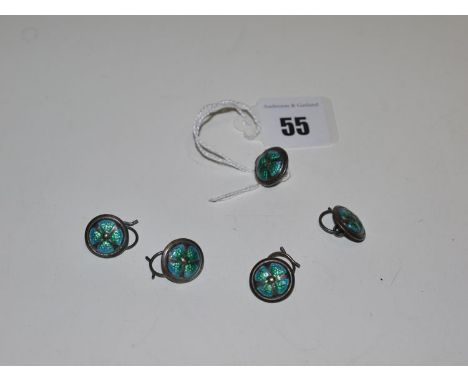 Five Arts & Crafts silver and enamel buttons, stamped 'Solid Silver A & B'.