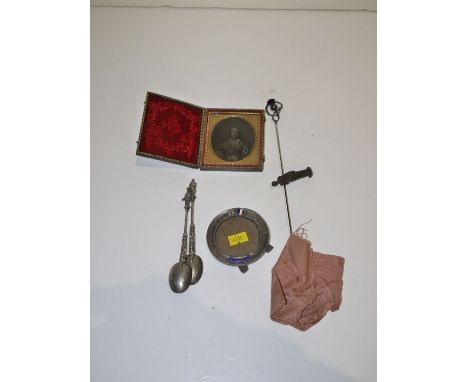 A silver and enamel mounted photograph frame for a Hero of the First World War, inscribed "Our Hero"; together with a pair of