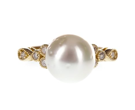 SOUTH SEA PEARL AND DIAMOND RING, the spherical pearl 9mm in diameter, flanked by four round brilliant cut diamonds, marked 1