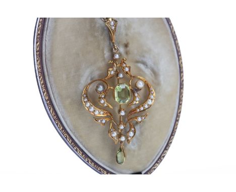GREEN GEM SET AND PEARL BROOCH PENDANT, with step cut and pear shaped green gems and split seed pearls, marked 15T,on an unma