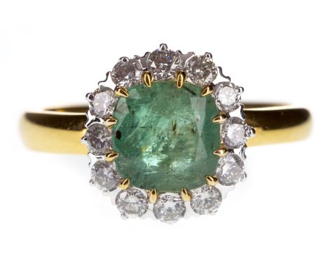 EMERALD AND DIAMOND RING, the cushion shaped emerald within a round brilliant cut diamond halo, the diamonds totalling approx