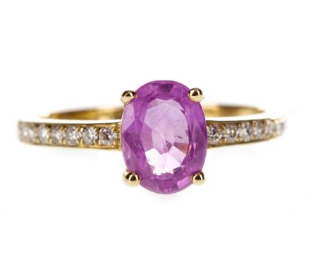 PINK SAPPHIRE AND DIAMOND RING, the oval pink sapphire with round brilliant cut diamonds to each shoulder, marked 585, size K