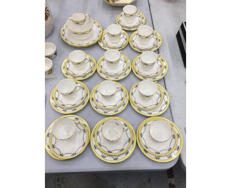 A COLLECTION OF SHELLEY TEAWARE PATTERN NO D11095/3 TO INCLUDE TWELVE TRIOS, SANDWICH PLATES, JUG AND SUGAR BOWL 