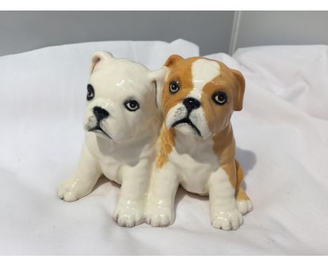 A ROYAL DOULTON 'THE BULLDOG PUPS' FIRST 