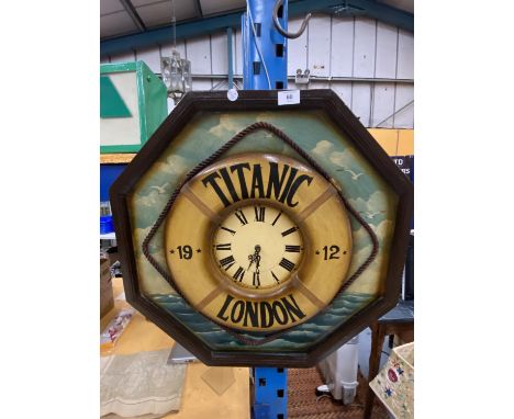 A LARGE HEXAGONAL CLOCK DEPICTING THE TITANIC LIFE RING 61CM DIAMETER 