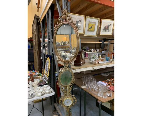 A GILT FRAMED OVAL MIRROR 80CM X 40CM, A SMALLER GILT FRAMED MIRROR 25CM X 35CM AND A GILT FRAMED BAROMETER 