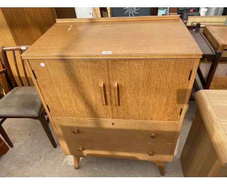 A MID 20TH CENTURY LIGHT OAK TALLBOY, 30" WIDE 