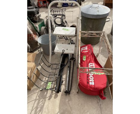 A LARGE ASSORTMENT OF ITEMS TO INCLUDE A WILSON TENNIS BAG CONTAINING VARIOUS RACKETS, A WROUGHT IRON LOG STAND AND A SMALL S