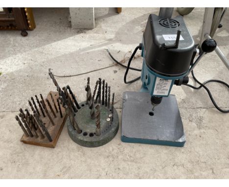 A SMALL DREMMEL PILLAR DRILL AND VARIOUS DRILL BITS 