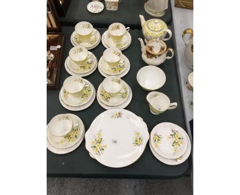 A COLLECTION OF ROYAL ALBERT TEAWARE DECORATED IN PALE YELLOW WITH DAFFODILS TO INCLUDE, SEVEN TRIOS, SANDWICH PLATES, CREAM 