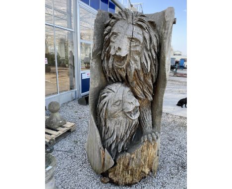 A LARGE WOODEN CARVED TRUNK OF TWO LIONS (H:190CM) 