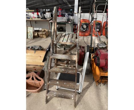 A VINTAGE FOUR RUNG WOODEN STEP LADDER, A FOLDING STEP AND A KITCHEN STEP 