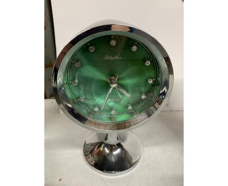 A RETRO RHYTHM SPACE CLOCK - WORKING AT TIME OF LOTTING 