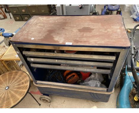 A LARGE WORKSHOP TOOL CHEST ON WHEELS, CONTAING AN ASSORTMENT OF TOOLS TO INCLUDE WIRE BRUSHES, SPANNERS AND A PIPE BENDER ET