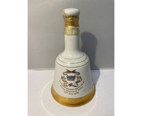 A BELL'S SCOTCH WHISKY, PERTH SCOTLAND, 40% VOL 50CL IN A COLLECTABLE WADE COMMEMORATIVE PORCELAIN DECANTER TO COMMEMORATE TH