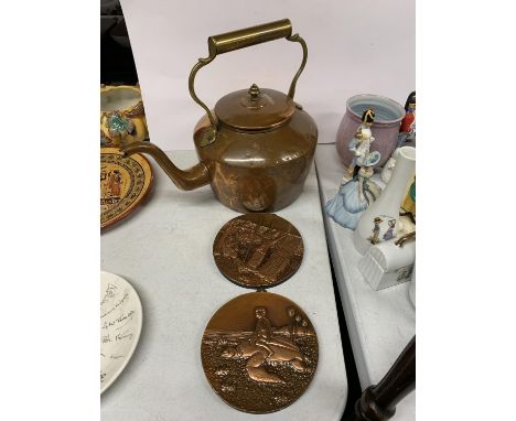 A LARGE COPPER KETTLE, WARMING PAN AND TWO HAND MADE MALAYSIAN PLAQUES 