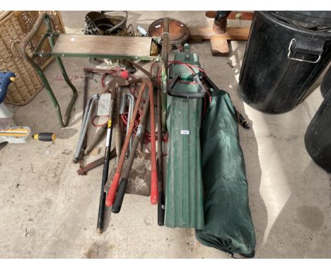 AN ASSORTMENT OF GARDEN TOOLS TO INCLUDE SHEARS, A QUALCAST TURBOVAC AND SAWS ETC 