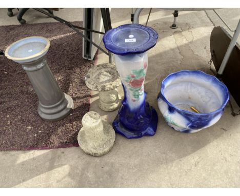 A LARGE CERAMIC JARDINAIRE AND STAND, TWO GARDEN ITEMS AND A CERAMIC PEDASTAL BASE 