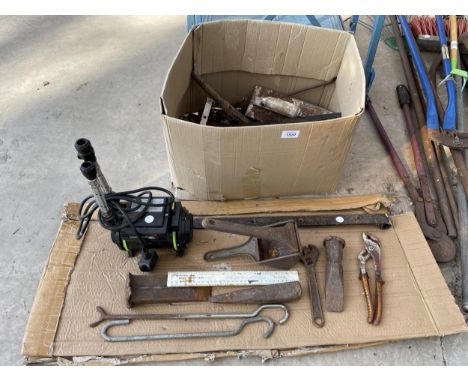 AN ASSORTMENT OF VINTAGE TOOLS TO INCLUDE SPANNERS, HINGES AND A WATER PUMP ETC 