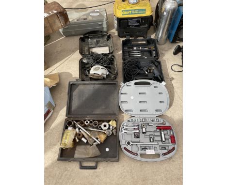 AN ASSORTMENT OF TOOLS TO INCLUDE SOCKETS, SPANNERS, A DRILL AND A PALM SANDER ETC 