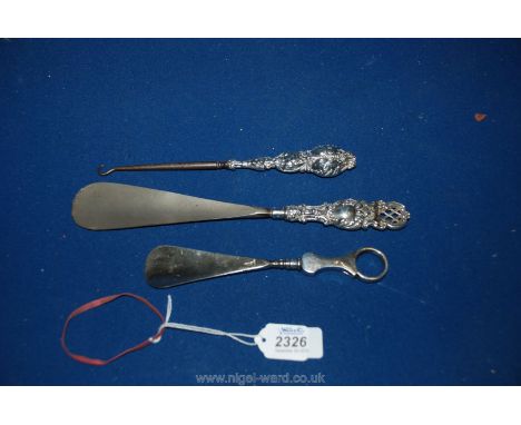 Two Silver handled Shoe Horns and a button hook