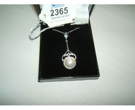 A Freshwater Pearl pendant on 925 silver chain