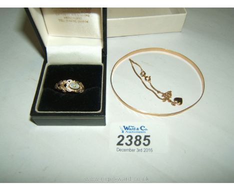 A 9ct Gold Bangle, fine chain Bracelet and a Ring set with an Opal, a/f.