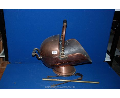 A Copper helmet shaped Coal Scuttle