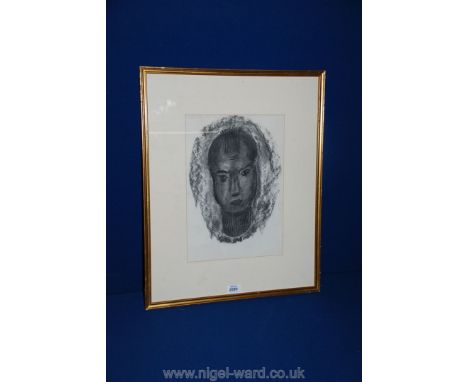A Charcoal portrait of an Eskimo, gilt framed