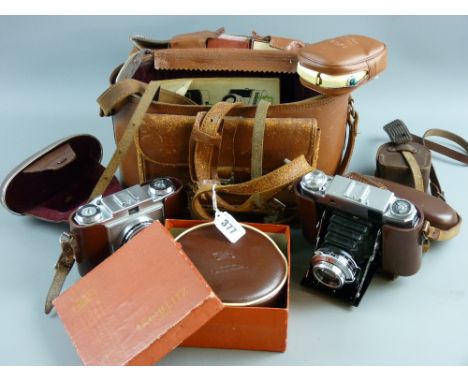 A Zeiss Ikon Contina vintage camera in leather case, a Zeiss Ikon Super Ikonta Bellows camera in leather case with boxed Ikob