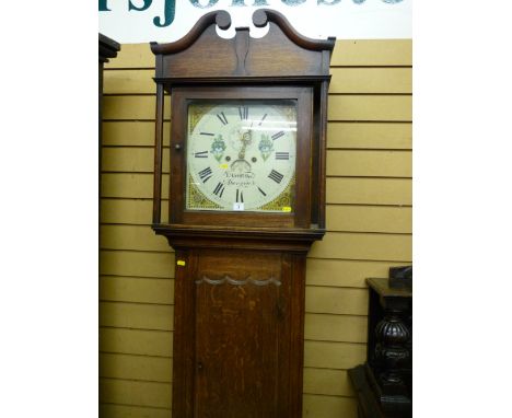 A 19th Century oak longcase clock, the hood with broken swan neck pediment and carved square pillars flanking a single glazed