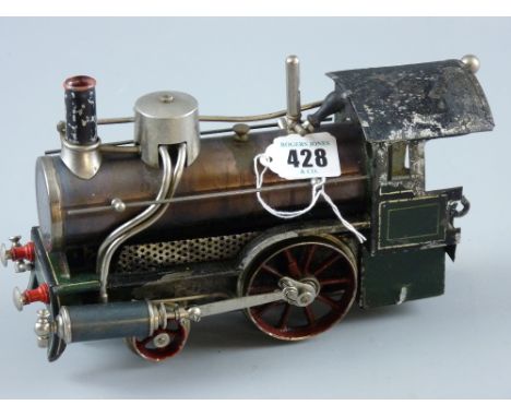 A part engineered gauge one model of a steam locomotive, early 20th Century, fuel burner intact and top mounted steam whistle
