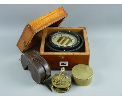 A brass cased pocket sextant stamped A Hobbs, London, 7.75 cms diameter with leather case and a wooden cased Milton, USA Star